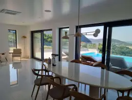 Beautiful modern villa with a swimming pool and sea view in a peaceful location