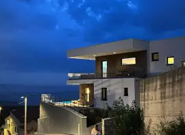 Beautiful modern villa with a swimming pool and sea view in a peaceful location