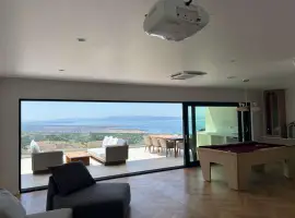 Beautiful modern villa with a swimming pool and sea view in a peaceful location