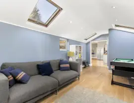 Stylish and spacious family home with off-street parking for two cars and a superb 21-meter-long…