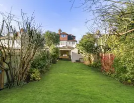 Stylish and spacious family home with off-street parking for two cars and a superb 21-meter-long…