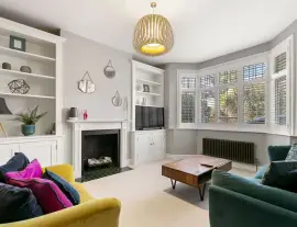 Stylish and spacious family home with off-street parking for two cars and a superb 21-meter-long…