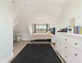 Stylish and spacious family home with off-street parking for two cars and a superb 21-meter-long…