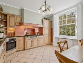 An absolutely charming four-bedroom house with a very private terrace, garden, and basement apartment, ideal in…