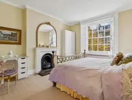 An absolutely charming four-bedroom house with a very private terrace, garden, and basement apartment, ideal in…