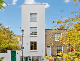 An absolutely charming four-bedroom house with a very private terrace, garden, and basement apartment, ideal in…