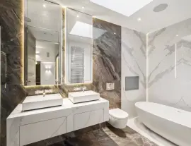 A state-of-the-art new building in a quiet cul-de-sac with spacious side living areas, outstanding design quality and