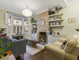 A stunningly renovated four-bedroom house in a quiet residential street with a south-facing garden.