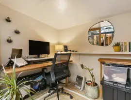 A stunningly renovated four-bedroom house in a quiet residential street with a south-facing garden.