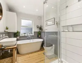 A stunningly renovated four-bedroom house in a quiet residential street with a south-facing garden.