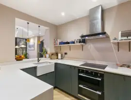 A stunningly renovated four-bedroom house in a quiet residential street with a south-facing garden.