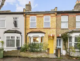 A stunningly renovated four-bedroom house in a quiet residential street with a south-facing garden.