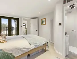 A stunningly renovated four-bedroom house in a quiet residential street with a south-facing garden.