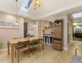 A stunningly renovated four-bedroom house in a quiet residential street with a south-facing garden.