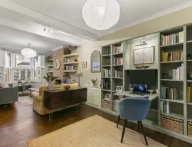 A stunningly renovated four-bedroom house in a quiet residential street with a south-facing garden.