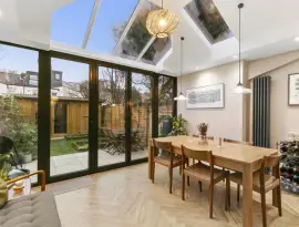 A stunningly renovated four-bedroom house in a quiet residential street with a south-facing garden.