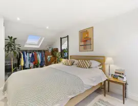 A stunningly renovated four-bedroom house in a quiet residential street with a south-facing garden.