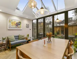 A stunningly renovated four-bedroom house in a quiet residential street with a south-facing garden.
