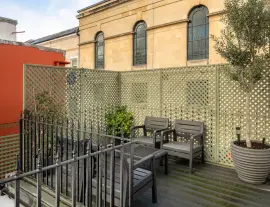 Exceptional family home at the end of a terrace with a superb entertainment room in prime Kensington