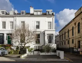 Exceptional family home at the end of a terrace with a superb entertainment room in prime Kensington
