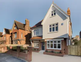 A newly built detached house with six bedrooms, spa, cinema and landscaped gardens.