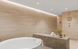 A newly built detached house with six bedrooms, spa, cinema and landscaped gardens.