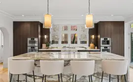 A newly built detached house with six bedrooms, spa, cinema and landscaped gardens.