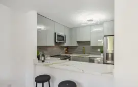 Bask in sunshine and style in this beautifully