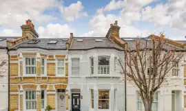 An extended family home in one of the most beautiful streets in Parsons Green