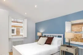 An extended family home in one of the most beautiful streets in Parsons Green