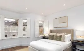 An extended family home in one of the most beautiful streets in Parsons Green