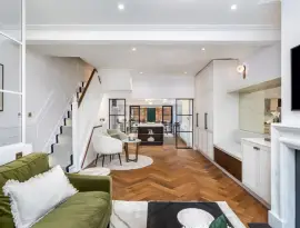 An extended family home in one of the most beautiful streets in Parsons Green