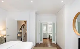 An extended family home in one of the most beautiful streets in Parsons Green