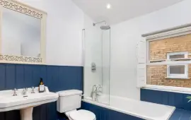 An extended family home in one of the most beautiful streets in Parsons Green