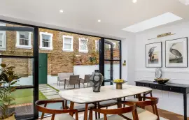 An extended family home in one of the most beautiful streets in Parsons Green