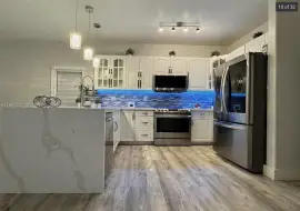 Modernly remodeled 4 bed, 2 bath Pool Home