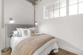 This architecturally striking one-bedroom