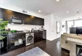  	Stunning studio in a sleek, modern Stanley Saitowitz