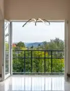 Premium three‑storey family home for sale in the green residential area of Budaörs, fully renovated
