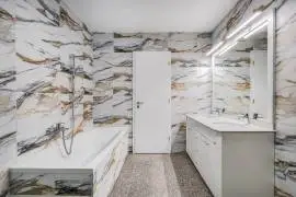 Premium three‑storey family home for sale in the green residential area of Budaörs, fully renovated