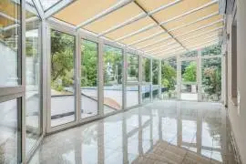 Premium three‑storey family home for sale in the green residential area of Budaörs, fully renovated