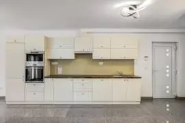 Premium three‑storey family home for sale in the green residential area of Budaörs, fully renovated