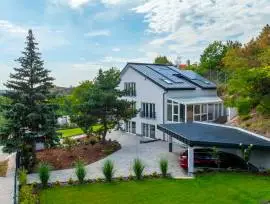 Premium three‑storey family home for sale in the green residential area of Budaörs, fully renovated